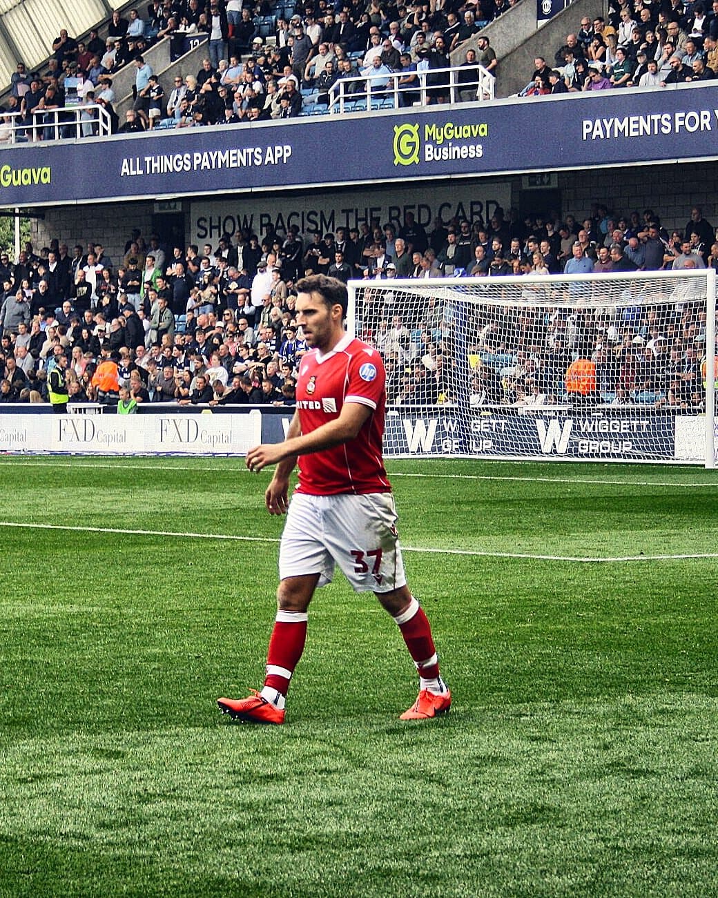 Matty James in Wrexham red during the match at Millwall, August 2025