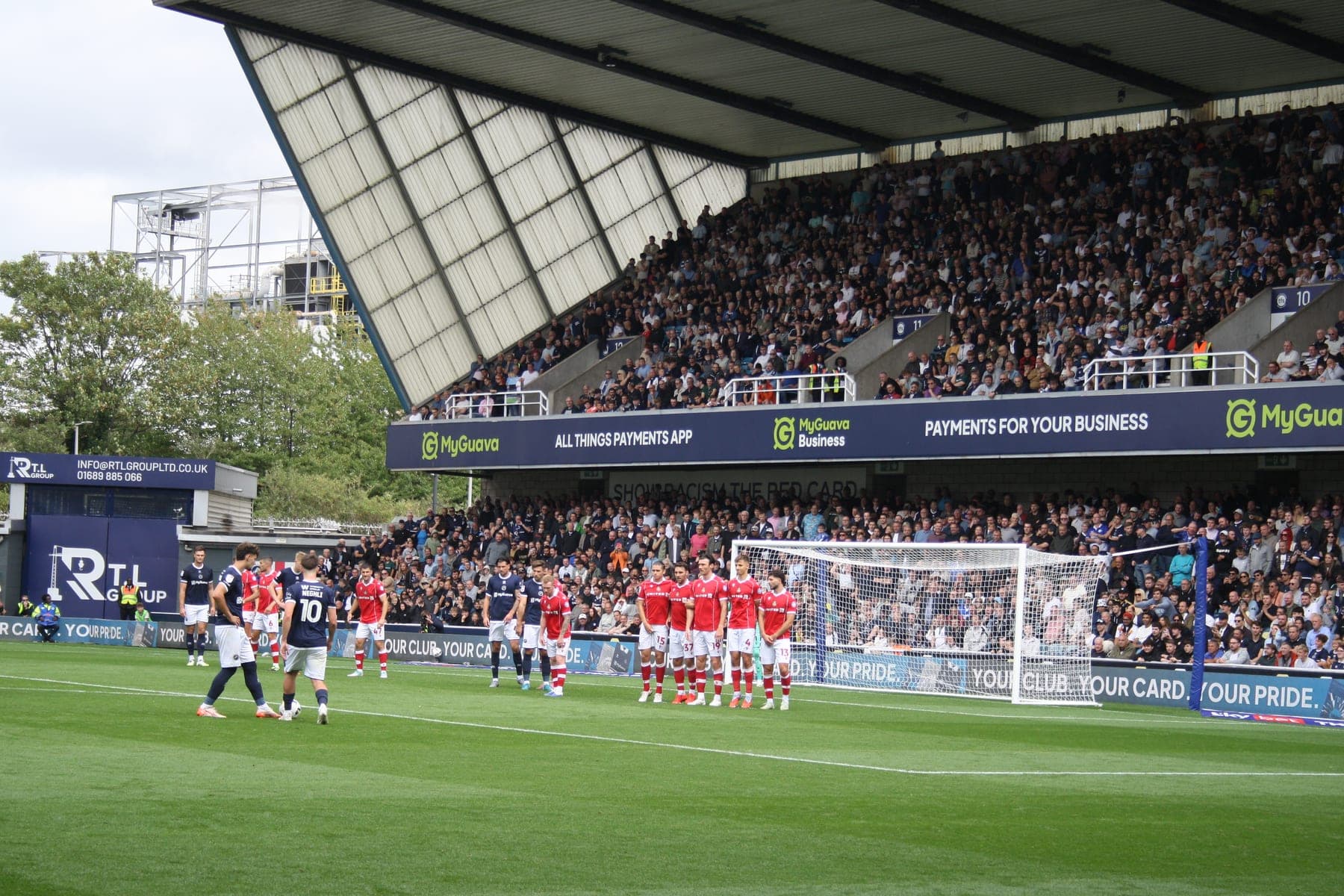 Wrexham line up a wall for a free kick at Millwall, August 2025