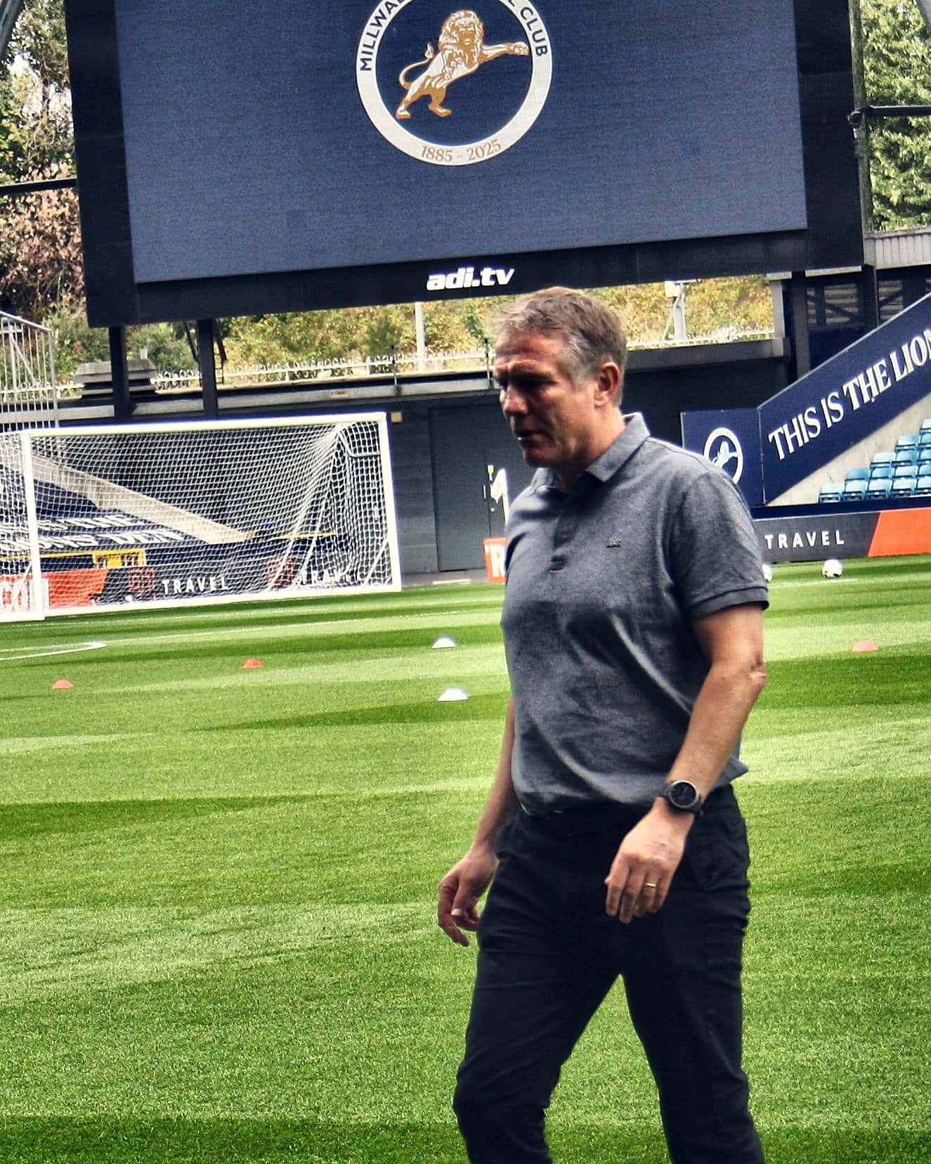 Wrexham manager Phil Parkinson on the pitch before the match at Millwall, August 2025